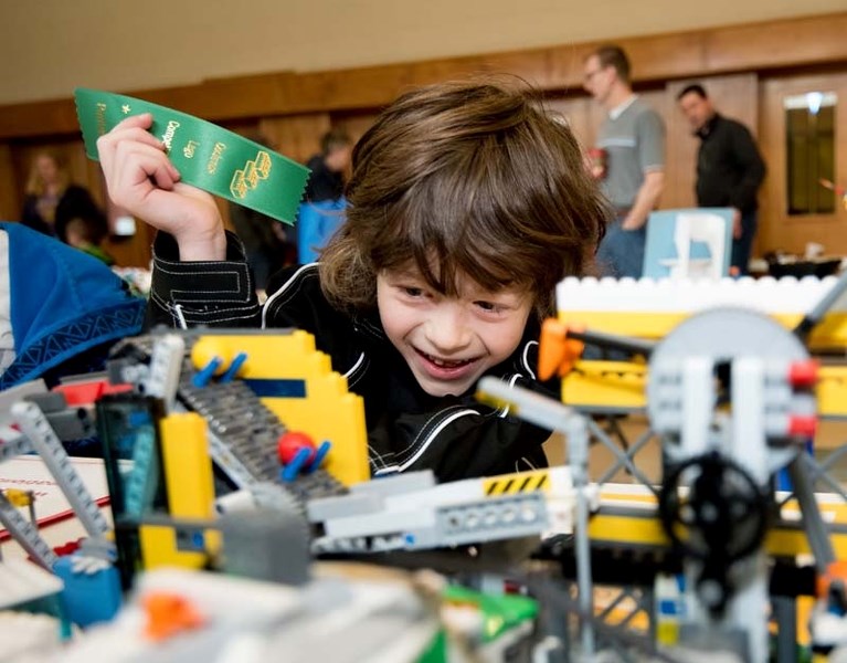 Rhys Stewart, 6, examines one of the winning lego pieces during the Fifth Cochrane Lego Competition at St. Andrew&#8217;s United Church in Cochrane on Saturday, April 1, 2017.