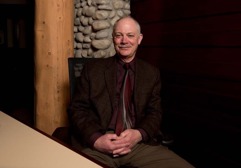 Julian deCocq poses for a portrait at the Cochrane Ranchehouse in Cochrane on Tuesday, March 28, 2017. DeCocq will be retiring as the CAO of the Town of Cochrane after 22