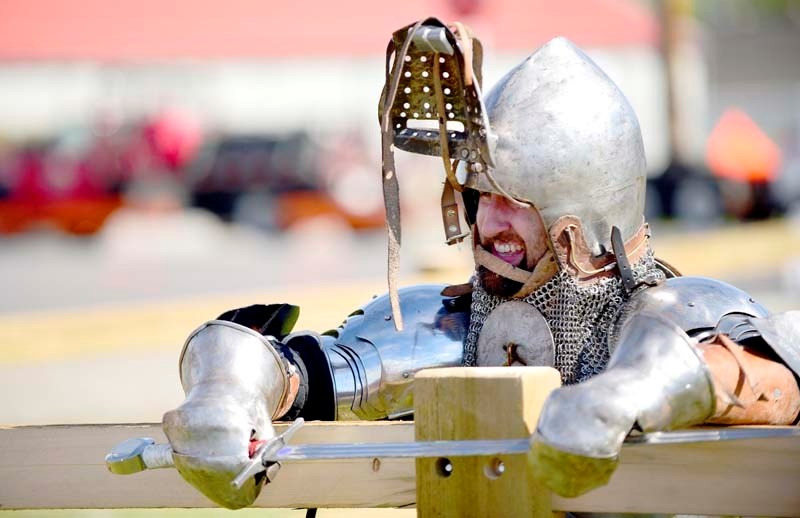Left, Cochrane&#8217;s Wade Ames battles Neal Sanche while Tyler Ames referees during the Iron Hart Vanguard&#8217;s demonstration of their competitive battles during