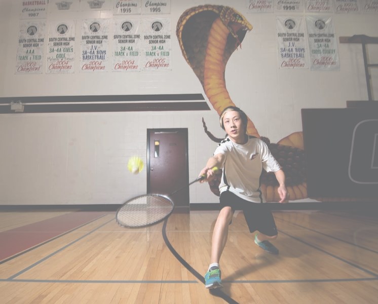 Jaden Seto, 14, practices badminton in his home gym at Cochrane High School in Cochrane on Tuesday, April 11, 2017. Seto and his partner, Claire Chang, were the silver medal