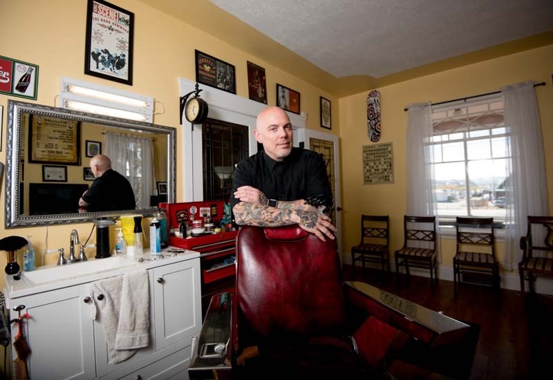 Juno-award-winning drummer Corbett Frasz in his Rock n&#8217; Roll Barbershop in Cochrane on Tuesday, April 18, 2017. Frasz opened his doors in December 2016.