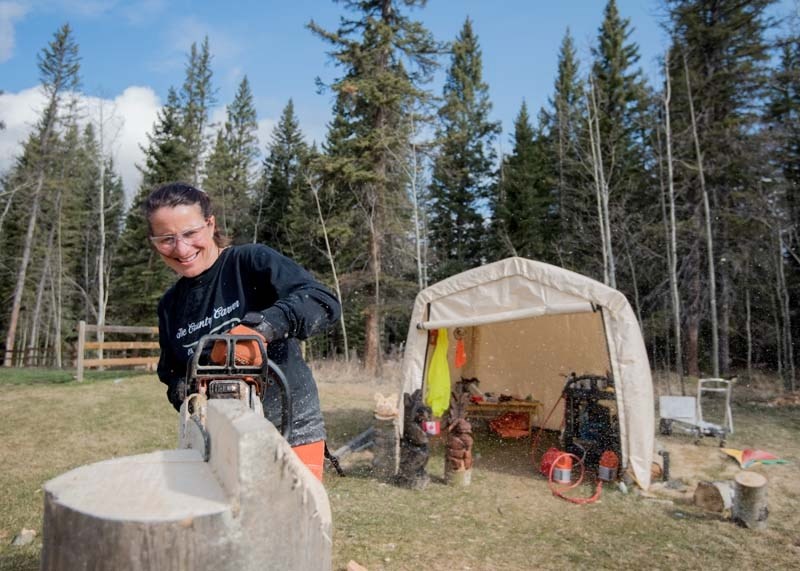 Local wood carver Patti Dippolito at her carving station in Cochrane on Tuesday, May 2, 2017. Dippolito began wood carving a year ago after being inspired by the TV series