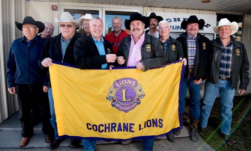 The local Lions Club take possession of the Cochrane Curling Club in Cochrane on Friday, April 28.