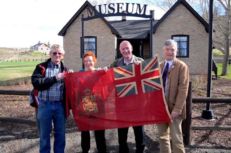 The Cochrane Historical and Archival Preservation Society (CHAPS) received a 1906 Alberta Flag from historical collector Dave Raymont from Toronto on May 4, 2017. Left to