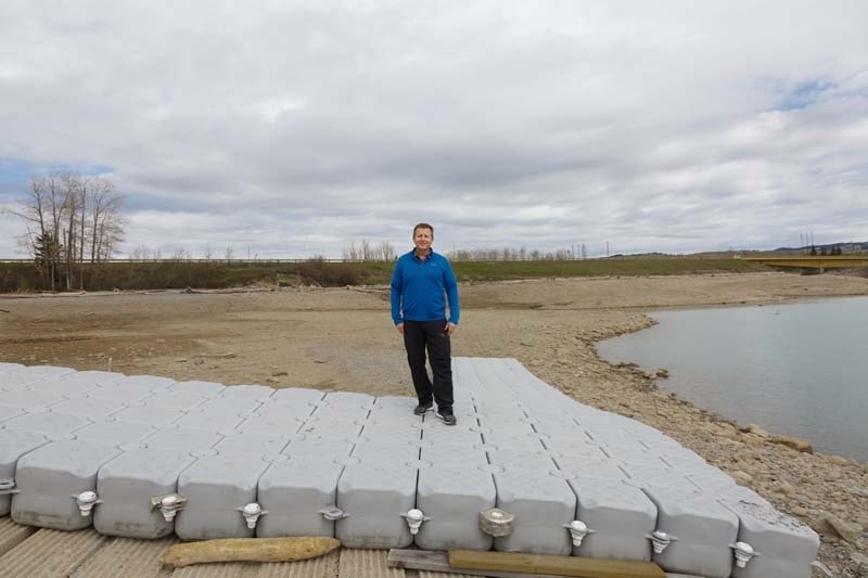 Mike Weinert stands on the loading dock that should reach the Ghost Lake water on May 9. Weinert has been running both Ghost Lake provincial park and his business, Ghost Lake 