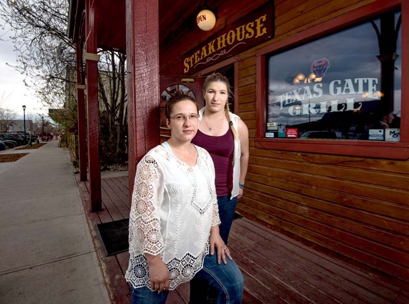 JJ Ludwig, left, and her daughter Mikita in front of their business, the Texas Gate, in Cochrane on Friday, May 5, 2017. The Ludwig&#8217;s had a carbon monoxide scare as a