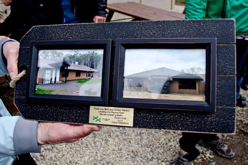 Beth Rankin, donor of the new Rankin Hall at the Boys and Girls Club of Calgary Camp Adventure shows off her gift at the unveiling ceremony on May 26.