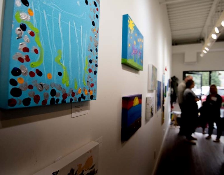 Paintings created by youth on display at Smyth Art and Studio in Cochrane on Saturday, June 10, 2017.