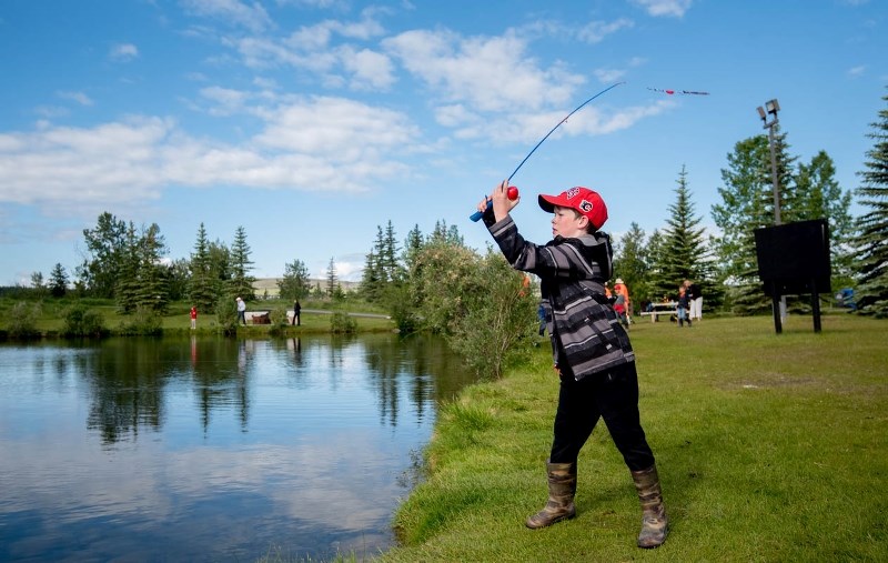 Thomas Zinter, 10, casts his line during the Kids Can Catch event at Mitford Pond in Cochrane on Saturday, June 17, 2017.