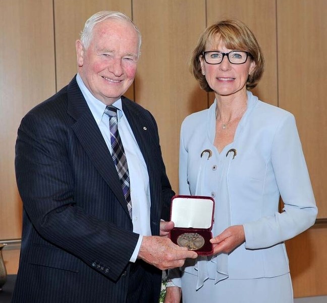 Patricia Pelton receiving the YMCA Fellowship of Honour award from Governor General David Johnston earlier this year.
