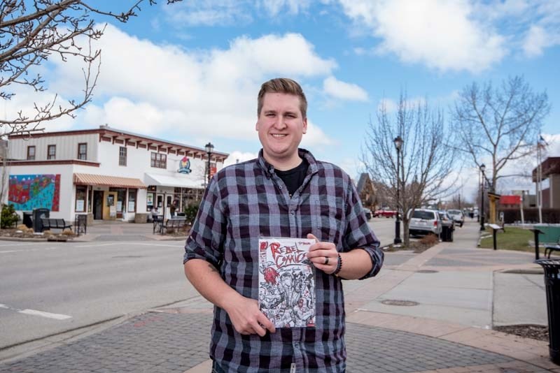 Comic book creator Tyler Petitclerc in Historic Cochrane Cochrane on April 25.