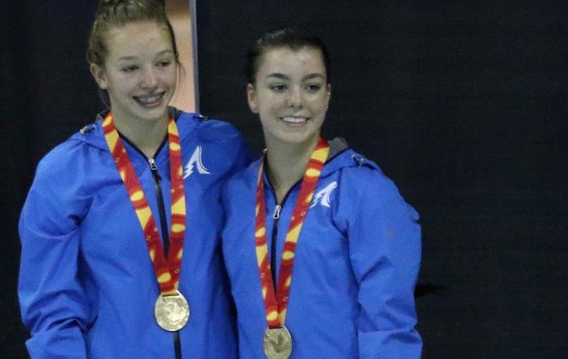 Diver Ashley McCool, right, takes home the gold at Canada Summer Games.