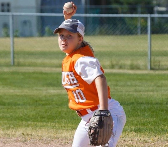 Maeve Maguire is the only girl playing for the Cochrane Minor Crush baseball team.