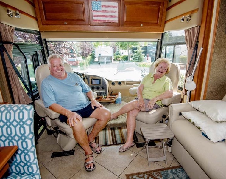 Florida travellers Greg and Dixie Colby relax in their RV at Bow RiversEdge Campground in Cochrane.