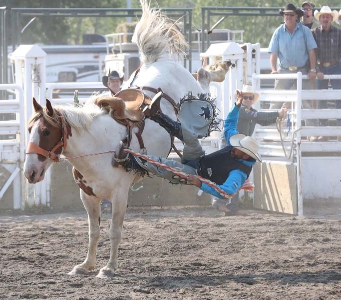 Edmonton cowboy and Police Air 1 Pilot Brian Griffith rides in the police rodeo.