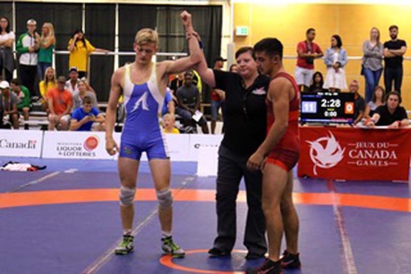 Connor McNeice, 17, won gold in the individual up to 65kg male category with a dominating score of 11-0 against Ontario.