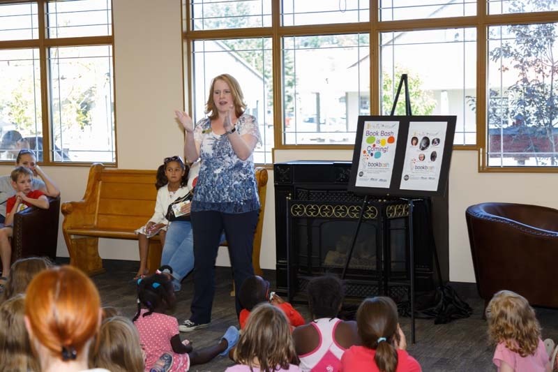 Librarian Andrea Johnston announces during the TD Summer Reading Club&#8217;s final party on Aug. 26 that the Cochrane library will host the 2017 Book Bash in October.