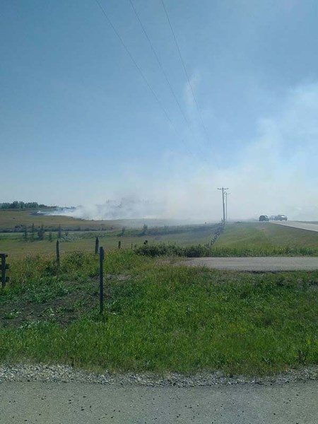 Crews from several departments battled a grass fire near Springbank last weekend.