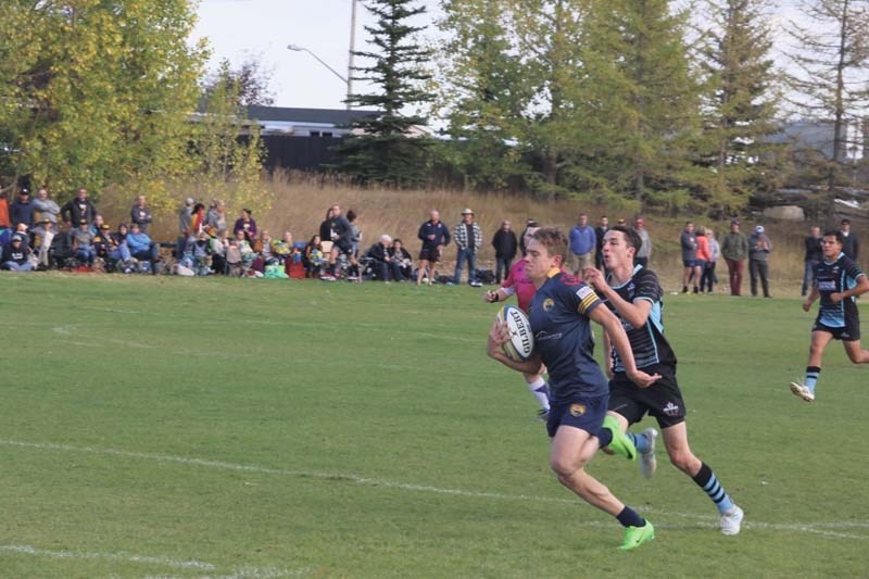 Bow Vally Grizzlies Cameron Birch carrys the ball in the Grizzlies 92-7 semi-final win.