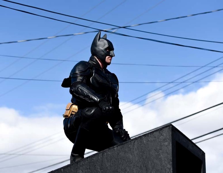 Rebel Comics made a Batmobile outhouse to race through Historic Downtown this weekend.