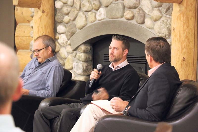 Mark Johnston from Mark&#8217;s No Frills speaks at the Chamber and the town of Cochrane&#8217;s economic development department breakfast meeting on Wednesday.