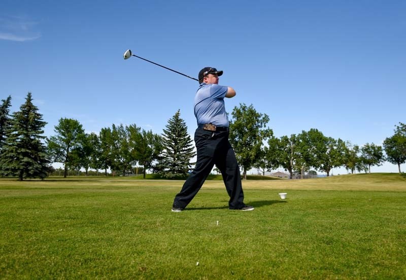 Paul Oldridge prepares for the Special Olympics Provincial tournament by practising at the McCall Lake Golf Course.