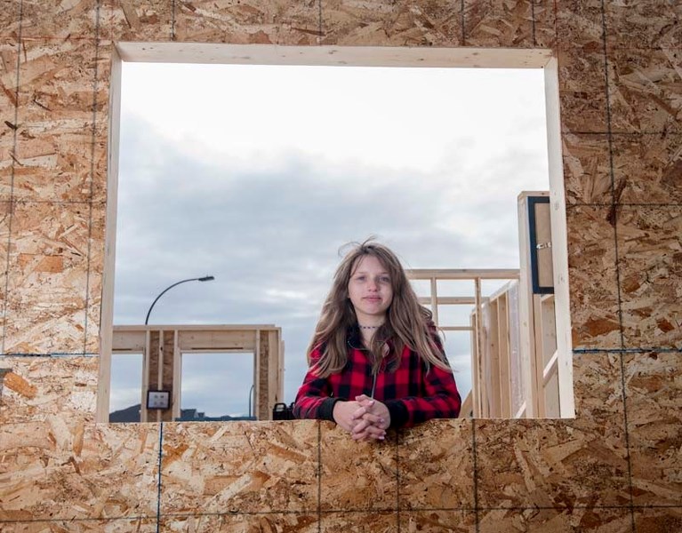 Twenty-eight youth from Bow Valley and Cochrane high schools hosted division officials, friends, teachers and builders for an outdoor celebration in the Willows at the house