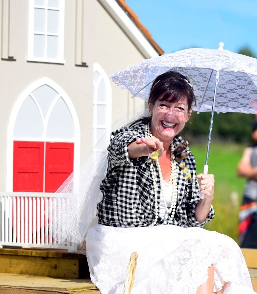 Kristine Sarsons of the Water Valley Church Event Centre stands in front of the church during Water Valley Days.