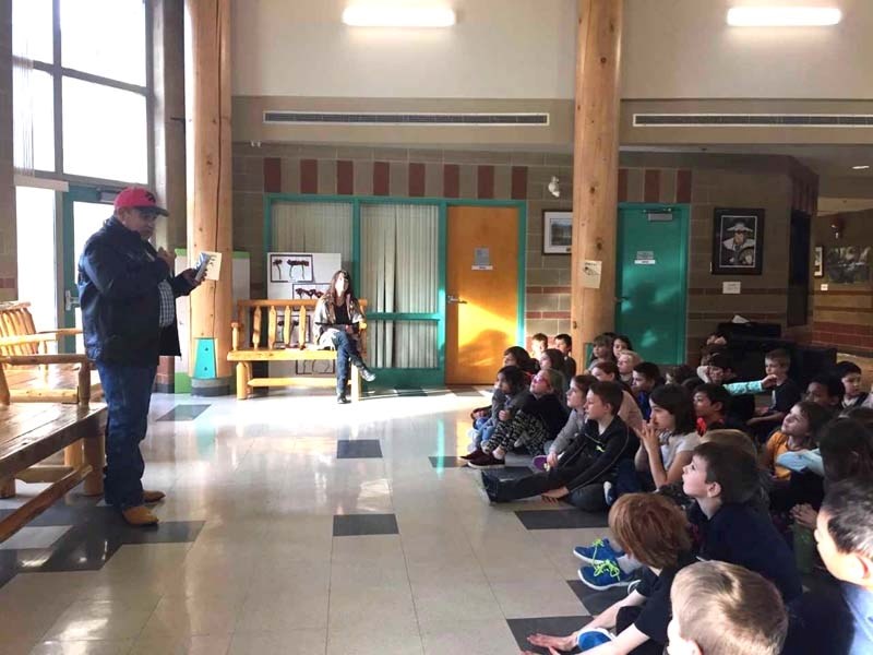 Piikani elder Wesley Provost speaks at Banded Peak School.