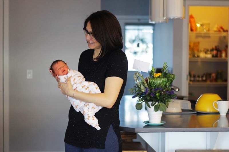 Gina Christakos with her daughter, Nova, who was delivered in the kitchen Dec. 30.
