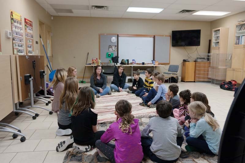 Particpants of the Cochrane and Area Humane Society gather every Thursday for an interactive evening with shelter animals.