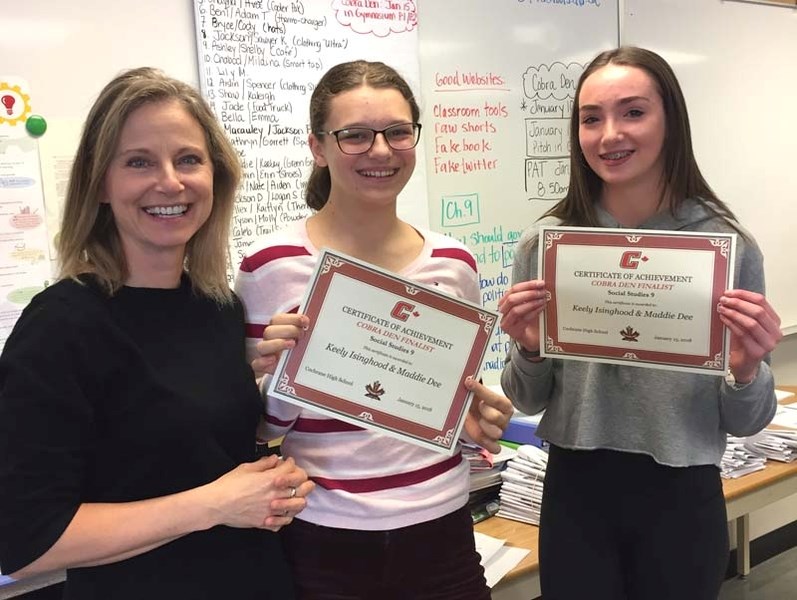 Tracy Lions (left) poses with students Keeley Isinghood and Maddie Dee, who placed in the top 10 at Cochrane High School&#8217;s Cobra Den entrepreneur event on Jan. 15