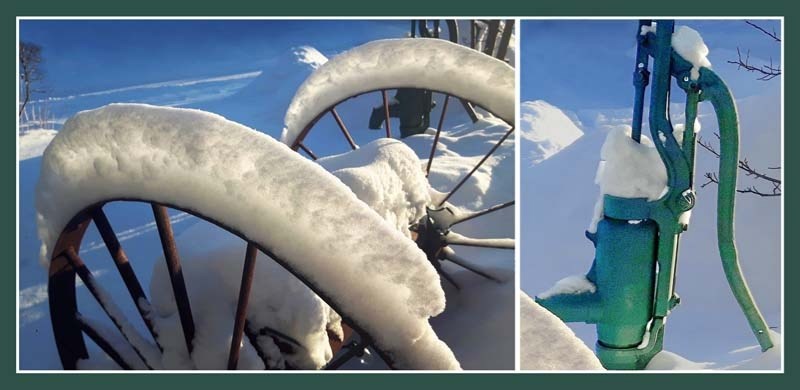 Snow on a pair of antique steel wheels on Paul Knudtson&#8217;s Bow Meadows lawn glows in the morning sun and outlines a nearby hand water pump rescued from the family