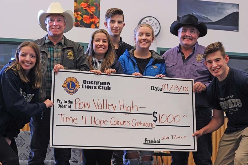 Bow Valley High School students accept a cheque from the Cochrane Lions Club to go towards the student&#8217;s Time for Hope event this year.