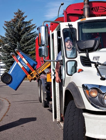Kevin Stadel is one of the collection drivers for the town&#8217;s recycling program, Roll With It Cochrane.