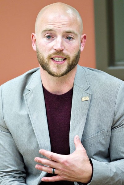 Mayor Truper McBride speaks at the Seniors on the Bow centre on Sept. 20. McBride made his first of several monthly visits to discuss municipal matters with attendees.