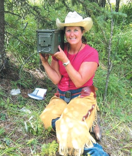 Cochrane&#8217;s Jolene Airth locates one of the caches during the Backcountry Race for STARS.