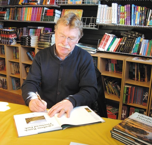 Fred Stenson signs copies of his book at Bentleys Books.