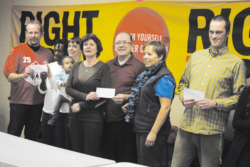 Kelly Kimmett, Lawrence, Leesha and baby Oasis Mafuru (Boma la Mama), Helen Parnell (Activettes), Mike Borody (Tournament of Aces chair), Kathy Haigh (Activettes) and Dylan