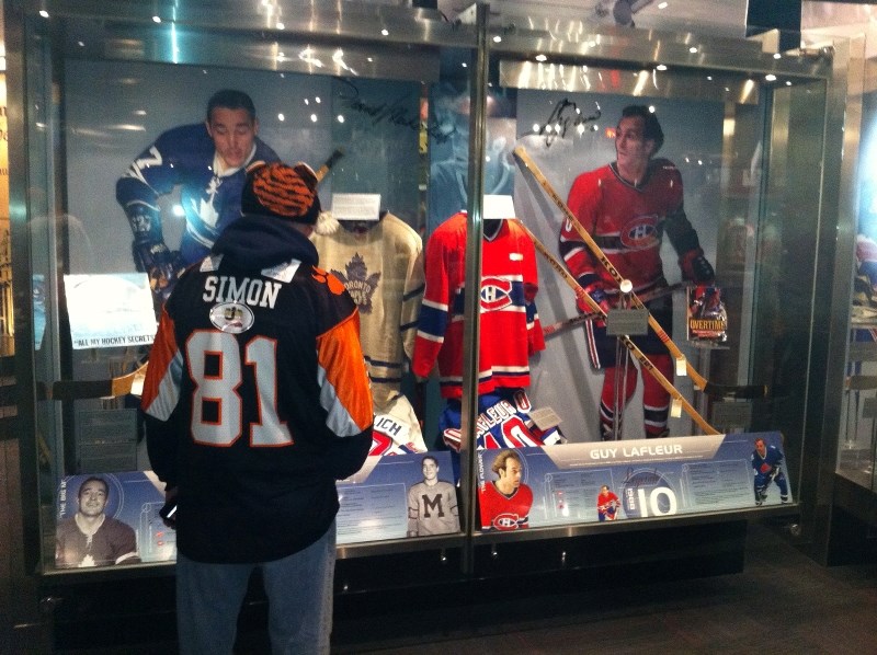 A B.C. Lions fan visits the Hockey Hall of Fame during Grey Cup weekend in Toronto.
