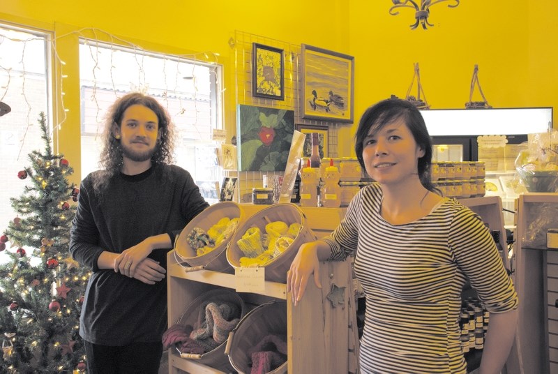 The Cochrane CookHouse celebrates its one-year anniversary on Dec. 16. The initiative&#8217;s coordinator, Tara Anderson, pictured here with employee Keane Wiebe, said