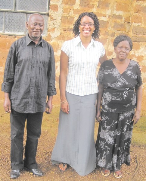 Nicole Taylor with her hosts, Pastor Lukwago and his wife Christine Lukwago, at the Kisaayke Primary School in Uganda.
