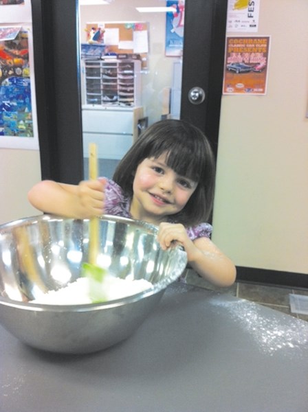 Sarah Smyth mixes up some delicious treats at the Little Chefs program at the Town of Cochrane. This holiday season, the Little Chefs whipped up Jody DiCastri&#8217;s soft