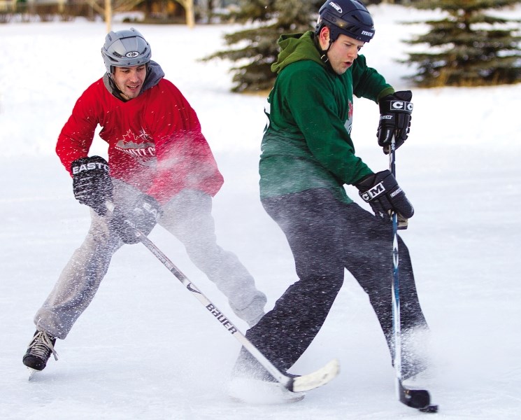 From right: Sprinting Turtles&#8217; Tim Janzen makes a quick turn with the puck to try and evade We Are Family 2&#8217;s Chad Kossowan during last year&#8217;s Kimmett Cup