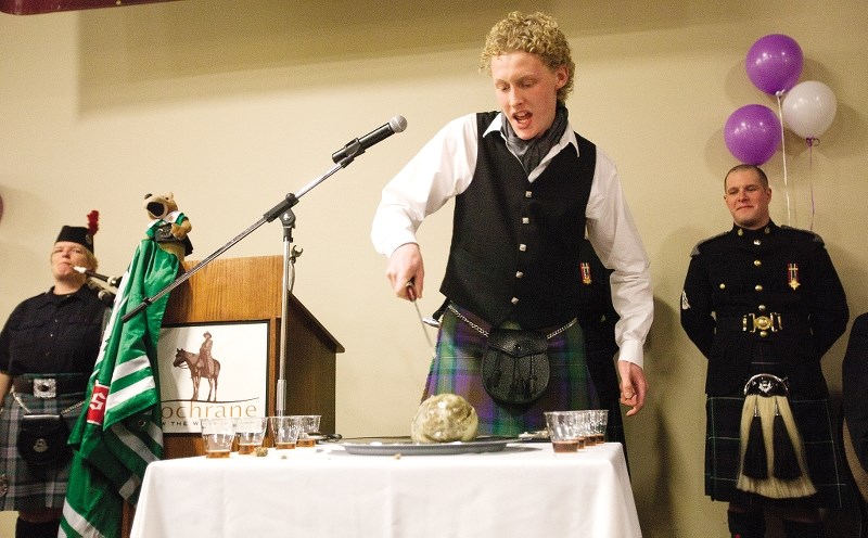 Eric Peach gives the address to the haggis at the annual Robbie Burns Night at the Cochrane RancheHouse in 2012.