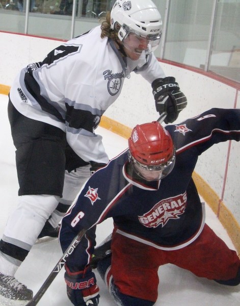 Medicine Hat Cubs defenceman Tanner Mayer gets his stick into Cochrane Generals defenceman Matt Krigel during Heritage Junior Hockey League play Jan. 26 at Spray Lake