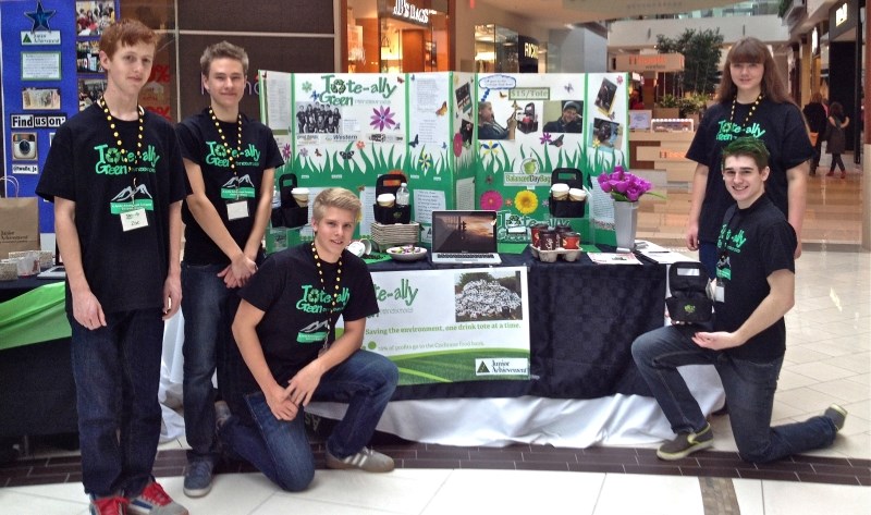 Tote-ally Green Distributors, a Cochrane-based junior achievement company, set up shop along their colleagues at the Junior Achievement of Southern Alberta Trade Show, held