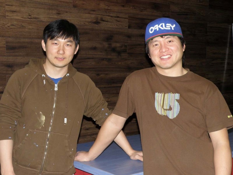 Jeff and Chris Lee work on their new restaurant Snack Mania which will open March 7 in the Bragg Creek Shopping Centre.