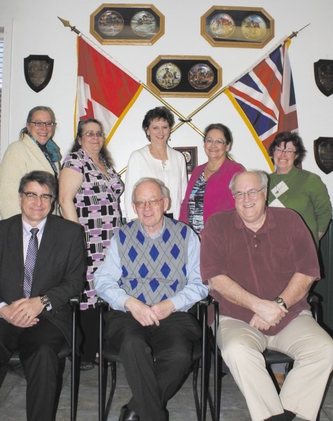 Back row, from left: Directors Betty-Anne Jansen, Krista Spensley, Tammy Williams, Cathy Hayes and Cheryl Hardy. Front, from left: Vice-president Martin Dienn, president Bill 