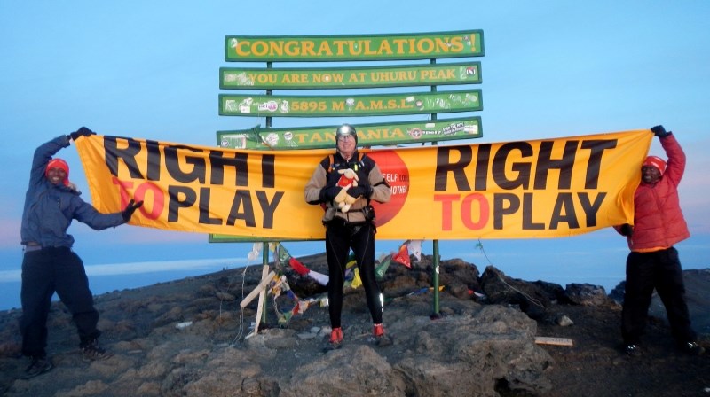 Success! Martin Parnell is flanked by guides Kidori (left) and Lau Mufuru at the Kilimanjaro summit.